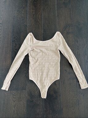 Free People Long Sleeve Ribbed Scoop Neck Bodysuit in Light Beige